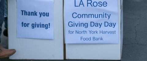 Donation boxes that say thank you for giving! and Community Giving Day in support of North York Harvest Food Bank.