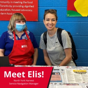 One person wearing a mask and an apron sits and smiles next to a person wearing a backpack and sunglasses. There is text on the bottom that reads Meet Elis! North York Harvest's Service Navigation Manager